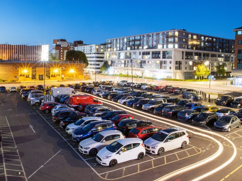 Aerial view of Princes Street Car illuminated at dusk with long exposure