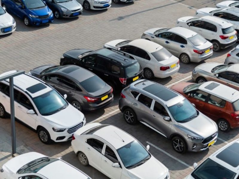 Lots of cars parking at outside carpark